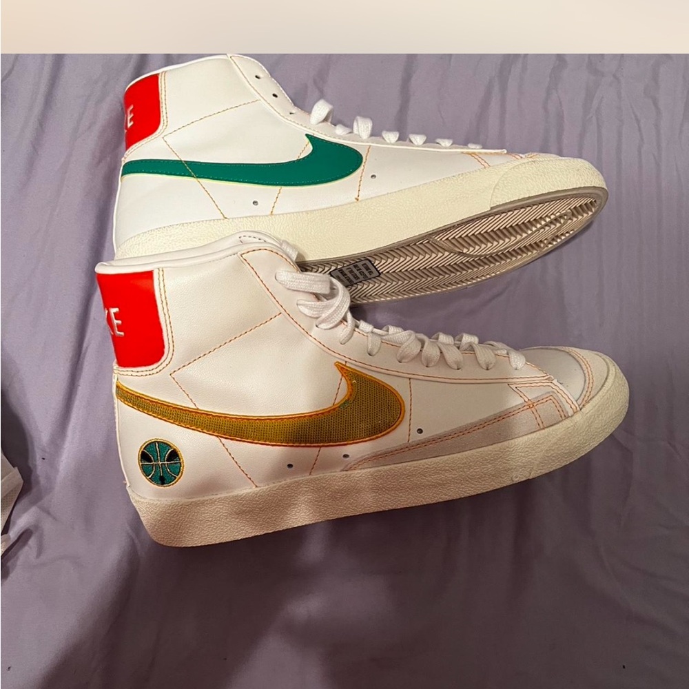 White High-Top Sneakers with Green and Gold Accents